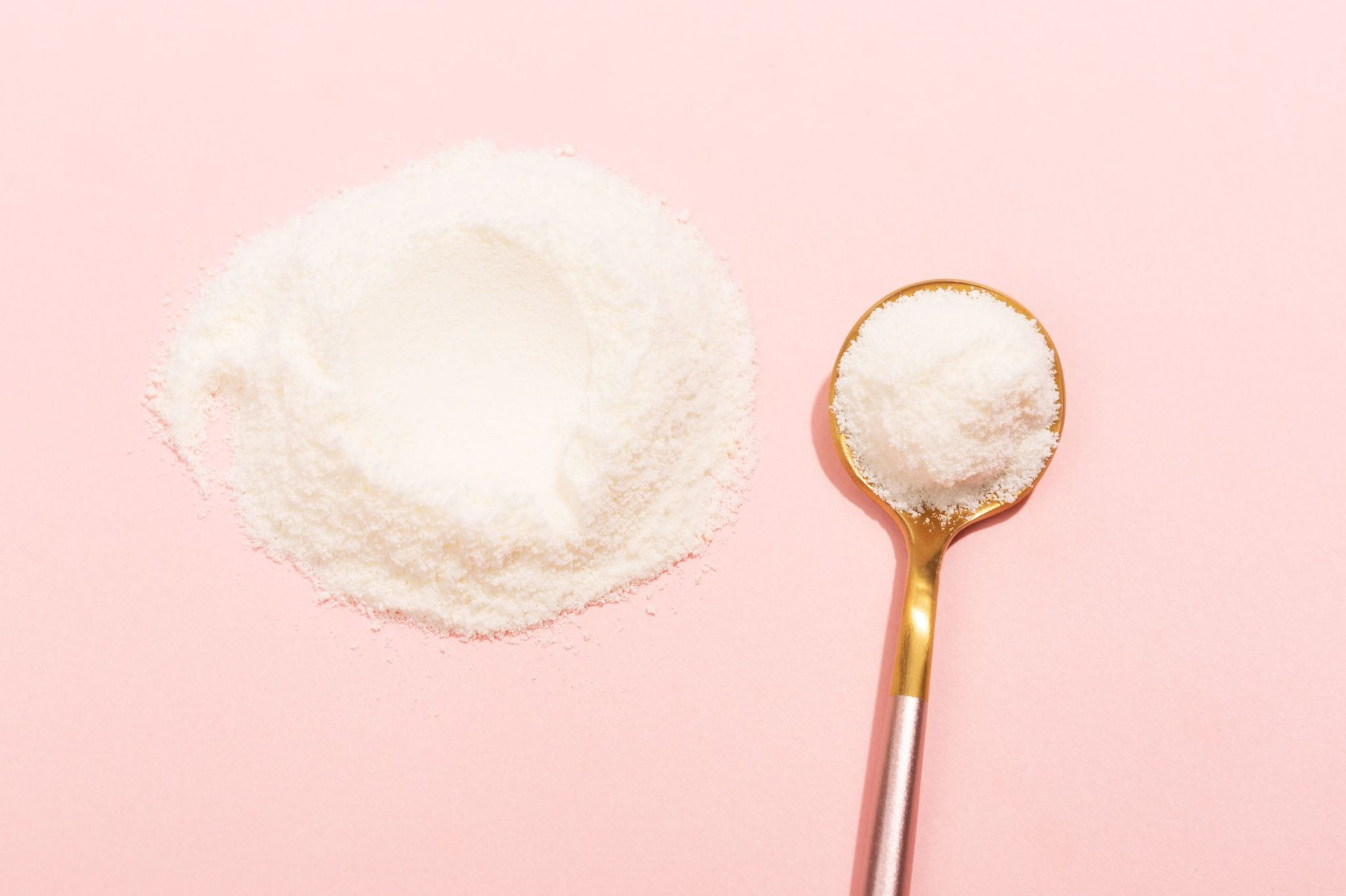 Bioactive elastin powder in a wooden bowl